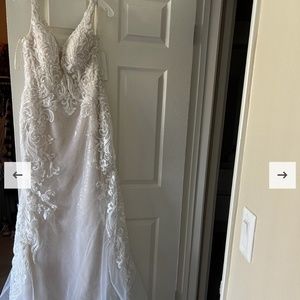 Wedding dress: Galina Signature